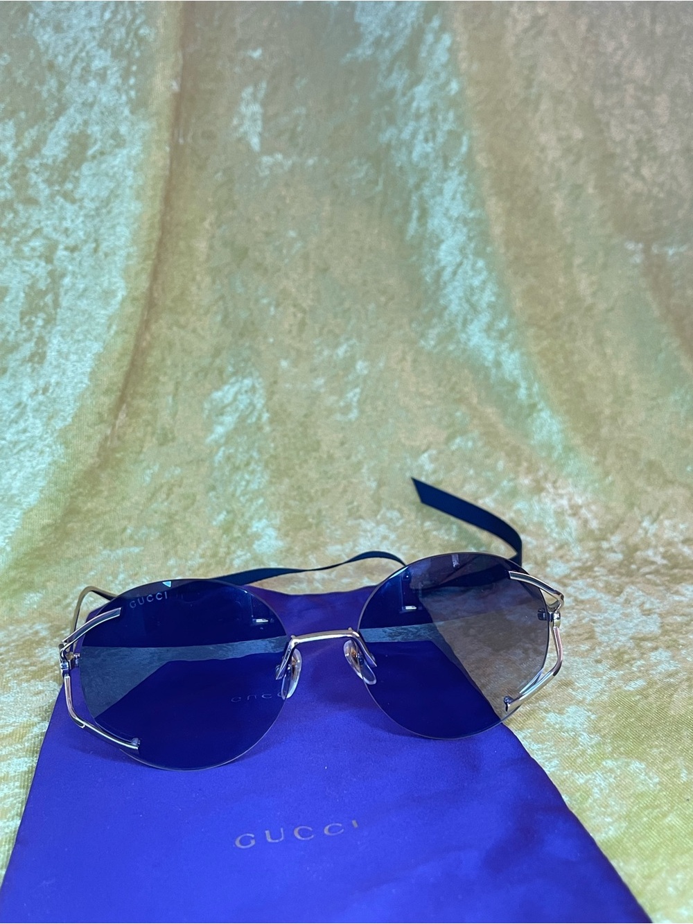 Gucci Women’s Rimless Sunglasses with Silver Metal Accents
